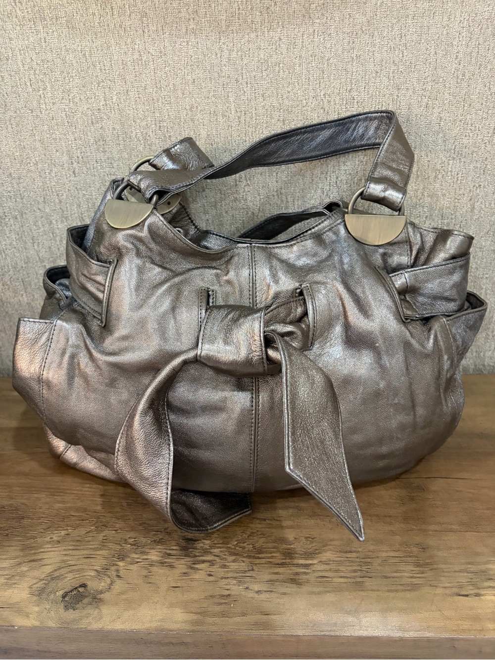 Kooba Metallic Pewter leather bag with Bow Accent